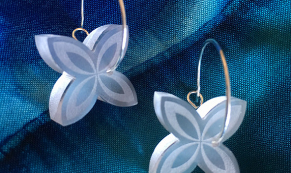 Etched plumeria hoop earring